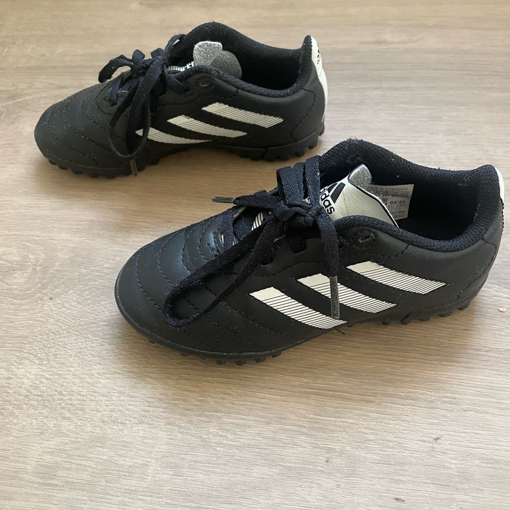 Adidas Kids Black and White indoor soccer shoes